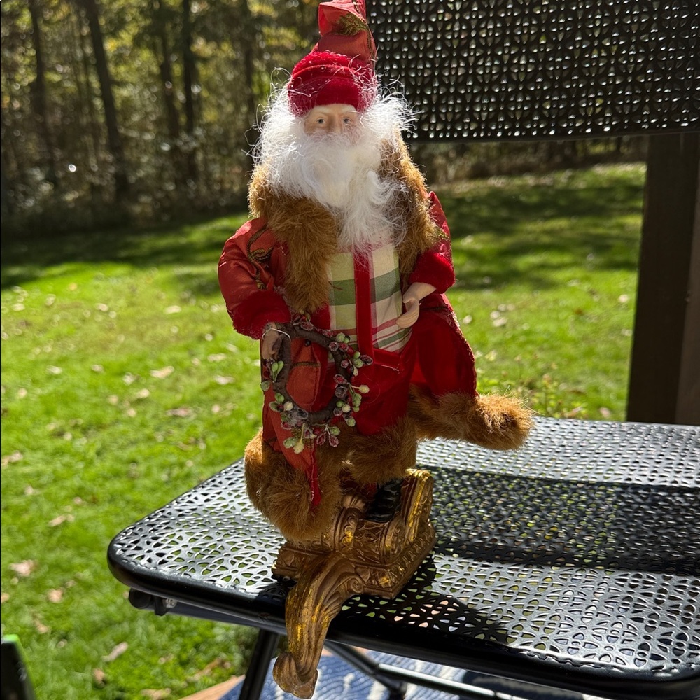 Festive Santa Claus Figurine in Red and Gold